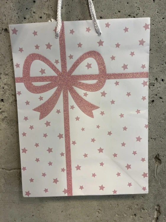 Dárková taška bílá s růžovou třpytivou mašlí 17.5x23cm